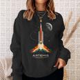 アルテミスii宇宙ロケット打ち上げミッショントゥザムーンアルテミス2 スウェットシャツ 彼女への贈り物