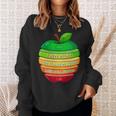 リンゴの力シリーズ リンゴのエネルギー リンゴ スライス 充電 バッテリー 残量 おもしろみ ユニーク 長袖tシャツ スウェットシャツ 彼女への贈り物