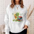 Unearth a Story Triceratops Dinosaur Reading Books Cute Dino Premium Tri-Blend Sweatshirt Gifts for Her