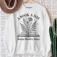 A Book A Day Keeps Reality Away Floral Reader Sweatshirt Gifts for Old Women A Book A Day Keeps Reality Away Floral Reader Sweatshirt Gifts for Old Women