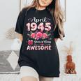 81歳 1945年4月 花柄 81歳 誕生日 男性 女性 レディースオーバーサイズコンフォートTシャツ Black