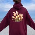 チューリップと蝶の花のデザイン。 レディース オーバーサイズ パーカー バックプリント Maroon