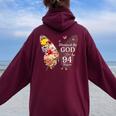 神に祝福され94年 蝶の花 94歳の誕生日 レディース オーバーサイズ パーカー バックプリント Maroon