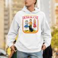Caring For Your Evil Cat Retro Dark Humor Book Cover Premium Tri-Blend Unisex Hoodie