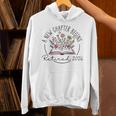 A New Chapter Retired 2026 Begins Retirement Wildflower Book Unisex Hoodie A New Chapter Retired 2026 Begins Retirement Wildflower Book Unisex Hoodie