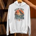 海 塩 自由 沿岸 愛国的 ワシ レトロ 夕日 長袖tシャツ パーカー