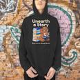 Women's Unearth A Story Reading Mammoth Prehistoric Book Librarian Men Hoodie Women's Unearth A Story Reading Mammoth Prehistoric Book Librarian Men Hoodie