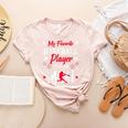 My Favorite Baseball Player Calls Me Mimi For Baseball Mom Women's Heather T-Shirt Heather Peach