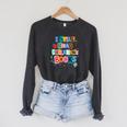 I Still Read Children's Books Librarian Teacher Life Premium Tri-Blend Raglan Sleeve Sweatshirt Dark Grey Heather
