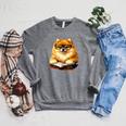 Cute Dog Pomeranian Reading Book Premium Tri-Blend Raglan Sleeve Sweatshirt Deep Heather