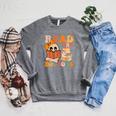 Groovy Booooks Ghost Read More Books Teacher Halloween Men Women Kids Raglan Sleeve Sweatshirt Deep Heather Groovy Booooks Ghost Read More Books Teacher Halloween Men Women Kids Raglan Sleeve Sweatshirt Deep Heather