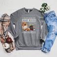 I Just Want To Read Books And Pet My Pomeranian Dog Premium Raglan Sleeve Sweatshirt Deep Heather