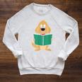 Cute Dog Reading A Human Training Book Dog Raglan Sleeve Sweatshirt Heather Mustard