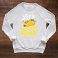 Let's Taco About Books Mexican Pun Bookworm Premium Tri-Blend Raglan Sleeve Sweatshirt Heather Mustard