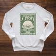 Unearth a Story Summer Reading 2026 Palaeontologists Book Raglan Sleeve Sweatshirt Heather Mustard