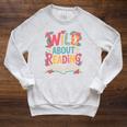Wild About Reading Book Reading Library Writer Premium Tri-Blend Raglan Sleeve Sweatshirt Heather Mustard