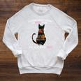 A Woman Cannot Survive On Books Alone She Also Needs CAT Raglan Sleeve Sweatshirt Heather Mustard