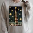 Astrologist Sitting On The Tower Of Stacked Up Books Starry Raglan Sleeve Sweatshirt Heather Forest