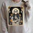 The Audiobook Girl Books Headphones Tarot Card Skeleton Raglan Sleeve Sweatshirt Heather Forest The Audiobook Girl Books Headphones Tarot Card Skeleton Raglan Sleeve Sweatshirt Heather Forest