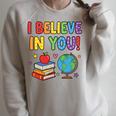 I Believe In You Educational Art With Books And Globe Raglan Sleeve Sweatshirt Heather Forest