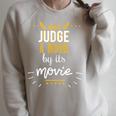 Booklovers Don't Judge A Book By Its Movie Raglan Sleeve Sweatshirt Heather Forest