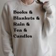 Books And Blankets And Rain And Tea And Candles Graphic Raglan Sleeve Sweatshirt Heather Forest