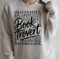 Booktrovert Reader Introvert Book Lover Premium Tri-Blend Raglan Sleeve Sweatshirt Heather Forest