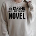 Be Careful Or I'Ll Put You In My Novel Book Author Raglan Sleeve Sweatshirt Heather Forest