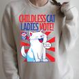 Childless Cat Ladies Vote Kamala Harris Cute Comic Book Cat Raglan Baseball Tee Raglan Sleeve Sweatshirt Heather Forest