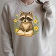Cute Raccoon Reading Book Flowers Floral Raglan Sleeve Sweatshirt Heather Forest