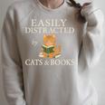 Easily Distracted By Cats And Books Cute Cat Reading Reader Raglan Sleeve Sweatshirt Heather Forest