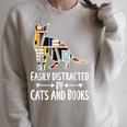 Easily Distracted By Cats And Books Reader Cat Lovers For Men Women Girls Kids Raglan Sleeve Sweatshirt Heather Forest