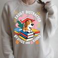 Easily Distracted By Dogs And Books Pets Books Lovers Raglan Sleeve Sweatshirt Heather Forest