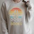 Easily Distracted By Dogs And Books Retro Vintage Dogs Lover Raglan Sleeve Sweatshirt Heather Forest