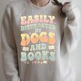 Easily Distracted By Dogs And Books Teacher Dog Mom Raglan Sleeve Sweatshirt Heather Forest Easily Distracted By Dogs And Books Teacher Dog Mom Raglan Sleeve Sweatshirt Heather Forest