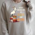 Easily Distracted By Goats And Books Goats And Book Reading Raglan Sleeve Sweatshirt Heather Forest