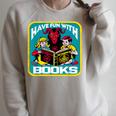Have Fun With Books Sarcastic Occult Retro Comic Dark Humor Raglan Sleeve Sweatshirt Heather Forest