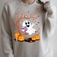 Ghost Reading Book On Swing Halloween Autumn Art Raglan Sleeve Sweatshirt Heather Forest