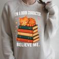 I'm A Book Character Believe Me Cat Reader Bookworm Raglan Sleeve Sweatshirt Heather Forest