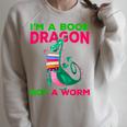 I'm A Book Dragon Not A Worm Books Reading Quotes Fun Raglan Sleeve Sweatshirt Heather Forest