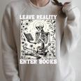 Leave Reality Enter Books Skeleton Reading Book Raglan Sleeve Sweatshirt Heather Forest