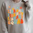 Library Squad Team Librarian Teacher Book Lover Retro Groovy Raglan Sleeve Sweatshirt Heather Forest Library Squad Team Librarian Teacher Book Lover Retro Groovy Raglan Sleeve Sweatshirt Heather Forest
