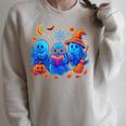 Little Ghost Coffee Tee Spooky Season Ghost Reading Book Raglan Sleeve Sweatshirt Heather Forest
