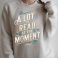 A Lot To Read At The Moment Retro Book Reader Raglan Sleeve Sweatshirt Heather Forest