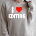 I Love Editing Heart Movie Film Newspaper Journalism Book Raglan Sleeve Sweatshirt Heather Forest