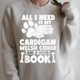 All i Need Is My Cardigan Welsh Corgi And a Good Book Raglan Sleeve Sweatshirt Heather Forest