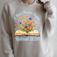 New Chapter Begins Retired 2026 Watercolor Floral Book Women Premium Tri-Blend Raglan Sleeve Sweatshirt Heather Forest
