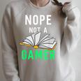 Nope Not a Gamer Bookworm Reader Book Lover For Teens Moms Raglan Sleeve Sweatshirt Heather Forest