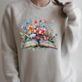 Open Book With Wildflowers Blooming Around Pages Raglan Sleeve Sweatshirt Heather Forest