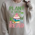 Plant A Seed Read Reading Summer 2026 Teacher Librarian Book Raglan Sleeve Sweatshirt Heather Forest